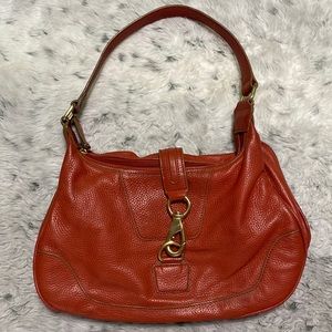 Wilson’s leather red-orange handbag